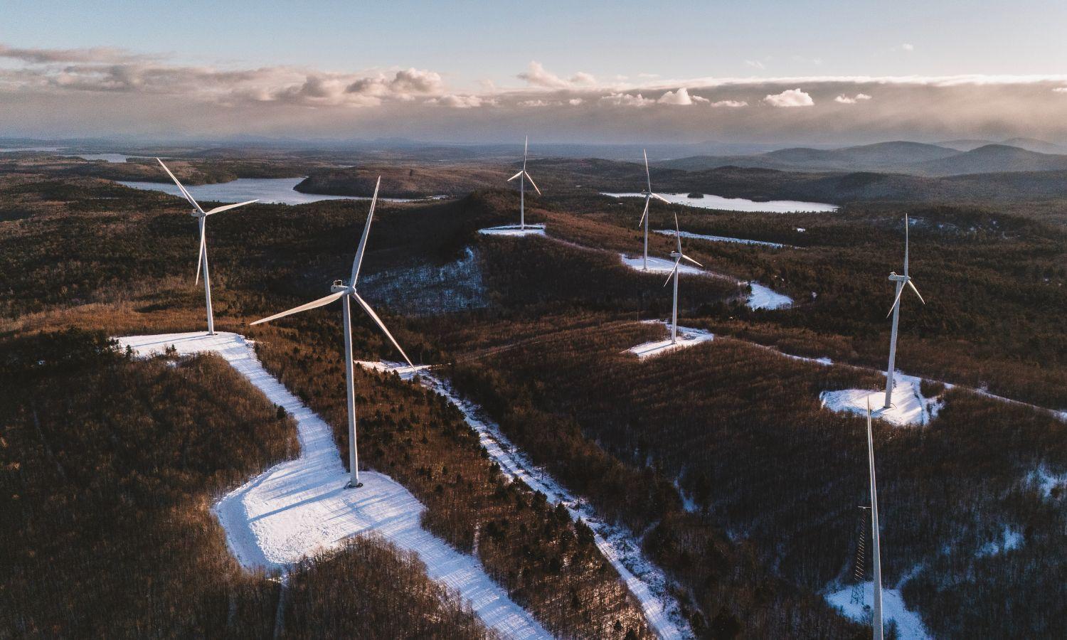 An aerial view of wind turbines.