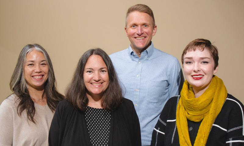 The UCS planned giving team standing in a row. From left to right, Tracy Donahoe, Linda Coffee, Eric St. Jacques, Annie Fontaine.
