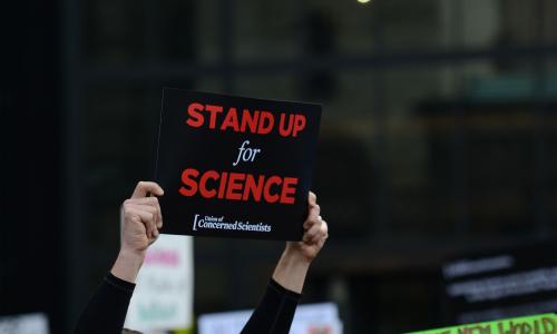 Stand up for Science sign held high