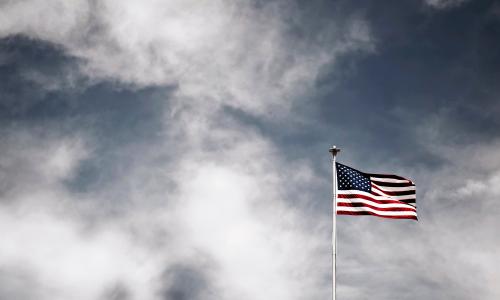 A flag against ominous background
