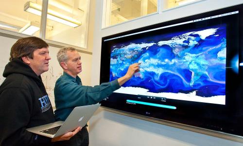 Scientists at Lawrence Berkeley National Laboratory inspect data from climate model projections.