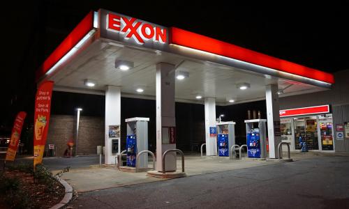 An Exxon gas station at night.