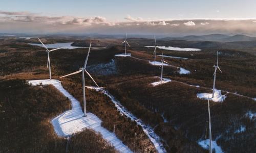 An aerial view of wind turbines.