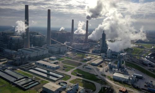 Aerial photo of the W.A. Parish Generating Plant in Thompson, TX, taken from the northwest. The Petra Nova carbon capture project appears on the right. 