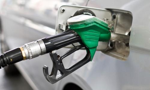 A gas pump in a car.
